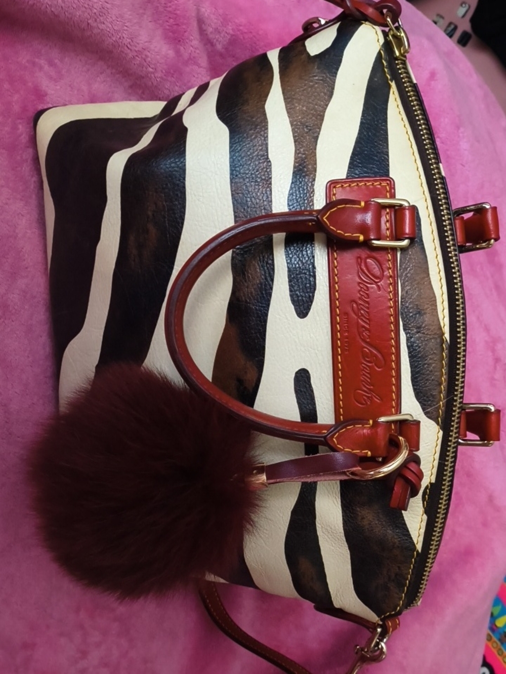 Dooney & Bourke Brown and Cream Zebra-Print Satchel with Pom Charm